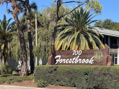Come see this absolutely stunning and meticulously maintained 2 on East Bay Golf Club in Florida - for sale on GolfHomes.com, golf home, golf lot
