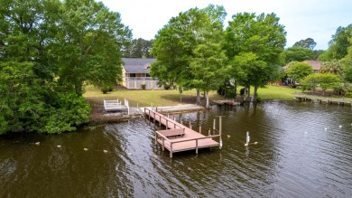 Enjoy waterfront living at it's best in this beautiful Lake on Players Course At Wyboo Plantation in South Carolina - for sale on GolfHomes.com, golf home, golf lot