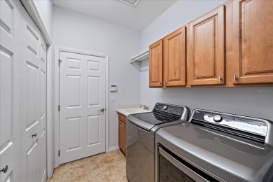 This single-family home built within the community of River on River Strand Golf and Country Club At Heritage Harbour  in Florida - for sale on GolfHomes.com, golf home, golf lot