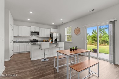 Welcome to this lifestyle-focused two-story home! Step inside on Lennon Hills Golf Course in North Carolina - for sale on GolfHomes.com, golf home, golf lot