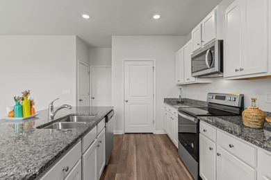 Welcome to this lifestyle-focused two-story home! Step inside on Lennon Hills Golf Course in North Carolina - for sale on GolfHomes.com, golf home, golf lot