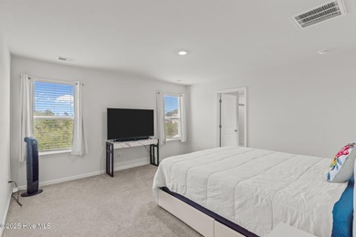 Welcome to this lifestyle-focused two-story home! Step inside on Lennon Hills Golf Course in North Carolina - for sale on GolfHomes.com, golf home, golf lot