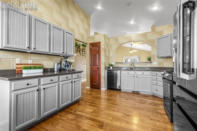 Immaculate, Upgraded Rancher with Golf Course Views + Heated on Antler Creek Golf Course in Colorado - for sale on GolfHomes.com, golf home, golf lot