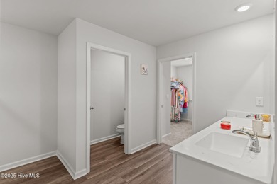 Welcome to this lifestyle-focused two-story home! Step inside on Lennon Hills Golf Course in North Carolina - for sale on GolfHomes.com, golf home, golf lot