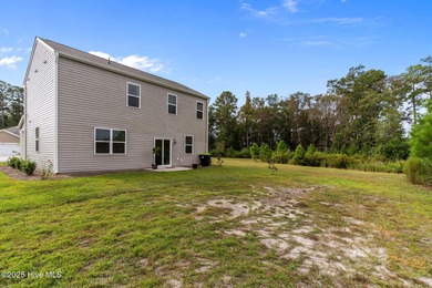Welcome to this lifestyle-focused two-story home! Step inside on Lennon Hills Golf Course in North Carolina - for sale on GolfHomes.com, golf home, golf lot