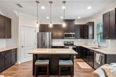 METICULOUSLY MAINTAINED 2 Bedroom, 2.5 Bath Townhome located in on Eagle Creek Golf Club in Florida - for sale on GolfHomes.com, golf home, golf lot