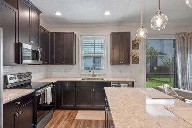 METICULOUSLY MAINTAINED 2 Bedroom, 2.5 Bath Townhome located in on Eagle Creek Golf Club in Florida - for sale on GolfHomes.com, golf home, golf lot