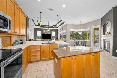 Experience timeless elegance and refined living in this stunning on Lake Jovita Golf and Country Club in Florida - for sale on GolfHomes.com, golf home, golf lot