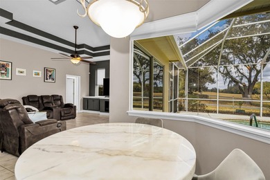 Experience timeless elegance and refined living in this stunning on Lake Jovita Golf and Country Club in Florida - for sale on GolfHomes.com, golf home, golf lot