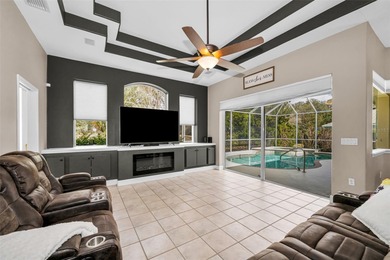 Experience timeless elegance and refined living in this stunning on Lake Jovita Golf and Country Club in Florida - for sale on GolfHomes.com, golf home, golf lot