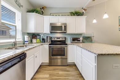 This spacious and well-appointed vacation property is a short on Palmilla Beach Golf Club in Texas - for sale on GolfHomes.com, golf home, golf lot
