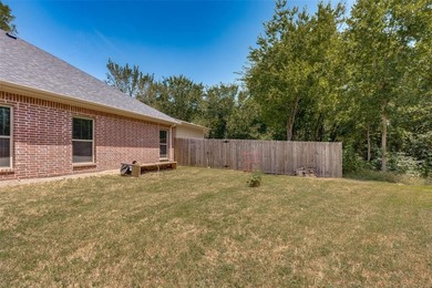 Beautifully maintained home located at 1501 Fairway Drive in on Woodlawn Country Club in Texas - for sale on GolfHomes.com, golf home, golf lot