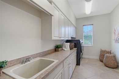 Privately positioned at the end of a quiet cul-de-sac on a rare on Lakewood Ranch Golf and Country Club in Florida - for sale on GolfHomes.com, golf home, golf lot