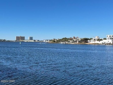 WATERFRONT, First floor, all one level.    Fabulous sunset views on Bay Point Resort Golf Club in Florida - for sale on GolfHomes.com, golf home, golf lot