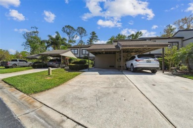 Welcome home! This 2-bedroom, 2.5-bath townhome is nestled in on East Lake Woodlands Country Club in Florida - for sale on GolfHomes.com, golf home, golf lot