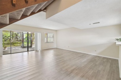 Welcome home! This 2-bedroom, 2.5-bath townhome is nestled in on East Lake Woodlands Country Club in Florida - for sale on GolfHomes.com, golf home, golf lot