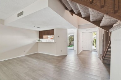 Welcome home! This 2-bedroom, 2.5-bath townhome is nestled in on East Lake Woodlands Country Club in Florida - for sale on GolfHomes.com, golf home, golf lot