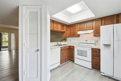 Welcome home! This 2-bedroom, 2.5-bath townhome is nestled in on East Lake Woodlands Country Club in Florida - for sale on GolfHomes.com, golf home, golf lot
