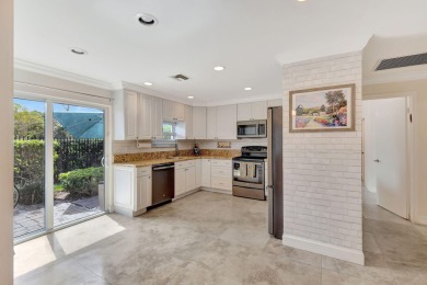Welcome to this beautifully updated 2-bedroom, 2.5-bathroom on Broken Sound Golf and Club  in Florida - for sale on GolfHomes.com, golf home, golf lot