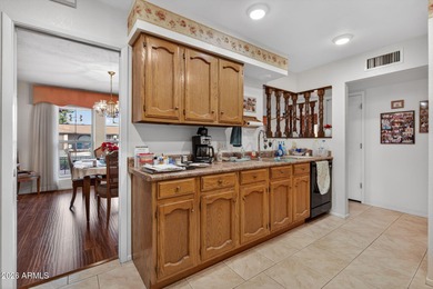 Well maintained and move-in ready 800 model is one of the on Sunland Village Golf Club in Arizona - for sale on GolfHomes.com, golf home, golf lot