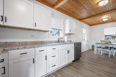 This stunning two-story home with an expansive and inviting on Waters Edge Golf Club in Illinois - for sale on GolfHomes.com, golf home, golf lot