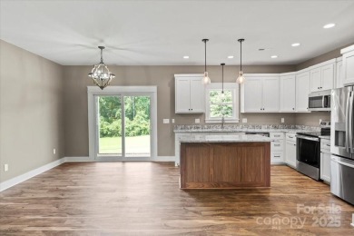 Introducing a stunning new construction home offering on Granada Farms Country Club in North Carolina - for sale on GolfHomes.com, golf home, golf lot