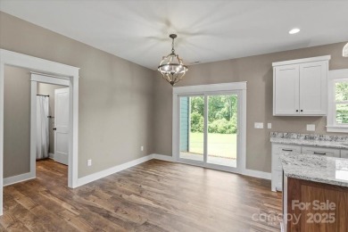 Introducing a stunning new construction home offering on Granada Farms Country Club in North Carolina - for sale on GolfHomes.com, golf home, golf lot
