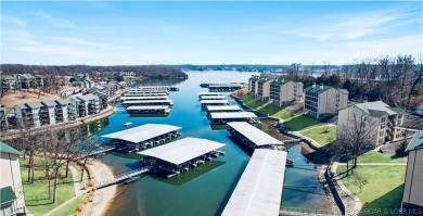 Welcome to your new lakefront getaway at Bristol Bay Condos! on Seasons Ridge At Four Seasons in Missouri - for sale on GolfHomes.com, golf home, golf lot