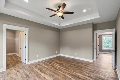 Introducing a stunning new construction home offering on Granada Farms Country Club in North Carolina - for sale on GolfHomes.com, golf home, golf lot