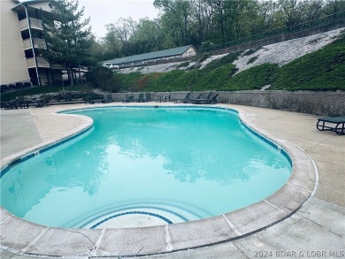 Welcome to your new lakefront getaway at Bristol Bay Condos! on Seasons Ridge At Four Seasons in Missouri - for sale on GolfHomes.com, golf home, golf lot
