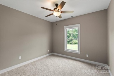 Introducing a stunning new construction home offering on Granada Farms Country Club in North Carolina - for sale on GolfHomes.com, golf home, golf lot