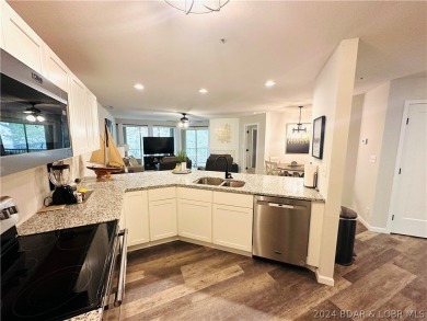 Welcome to your new lakefront getaway at Bristol Bay Condos! on Seasons Ridge At Four Seasons in Missouri - for sale on GolfHomes.com, golf home, golf lot