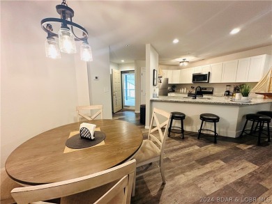 Welcome to your new lakefront getaway at Bristol Bay Condos! on Seasons Ridge At Four Seasons in Missouri - for sale on GolfHomes.com, golf home, golf lot