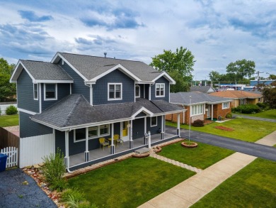 This stunning two-story home with an expansive and inviting on Waters Edge Golf Club in Illinois - for sale on GolfHomes.com, golf home, golf lot