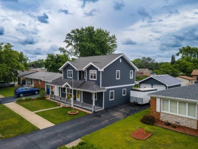 This stunning two-story home with an expansive and inviting on Waters Edge Golf Club in Illinois - for sale on GolfHomes.com, golf home, golf lot
