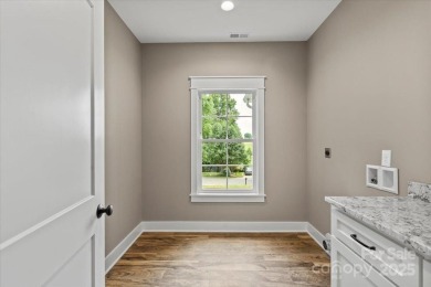 Introducing a stunning new construction home offering on Granada Farms Country Club in North Carolina - for sale on GolfHomes.com, golf home, golf lot