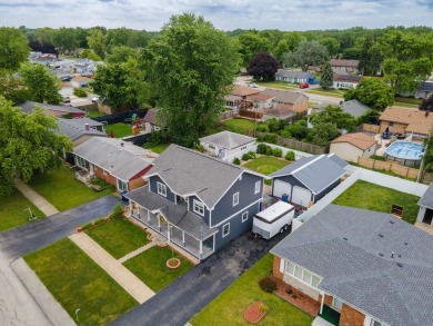 This stunning two-story home with an expansive and inviting on Waters Edge Golf Club in Illinois - for sale on GolfHomes.com, golf home, golf lot