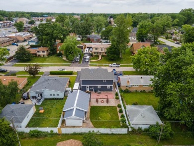 This stunning two-story home with an expansive and inviting on Waters Edge Golf Club in Illinois - for sale on GolfHomes.com, golf home, golf lot