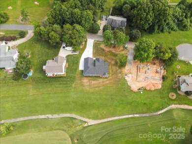 Introducing a stunning new construction home offering on Granada Farms Country Club in North Carolina - for sale on GolfHomes.com, golf home, golf lot
