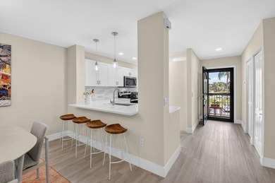 Experience refined country club living in this exquisitely on Hunters Run Golf and Country Club in Florida - for sale on GolfHomes.com, golf home, golf lot