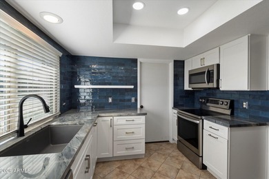 Beautifully updated 2BR/2BA culdesac townhome featuring a new on Leisure World Country Club in Arizona - for sale on GolfHomes.com, golf home, golf lot