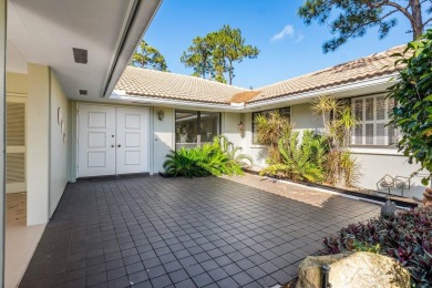 Nestled in a peaceful neighborhood, this 3-bedroom, 2-bath villa on Quail Ridge Golf Course and Country Club in Florida - for sale on GolfHomes.com, golf home, golf lot