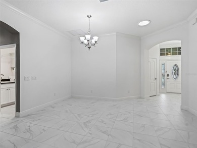 Welcome to refined Florida living in this exceptional Iris model on Pennbrooke Fairways in Florida - for sale on GolfHomes.com, golf home, golf lot