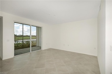 This southwest-facing GROUND FLOOR DiAngelo model, newly built on Panther Run Golf Club in Florida - for sale on GolfHomes.com, golf home, golf lot