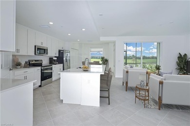 This southwest-facing GROUND FLOOR DiAngelo model, newly built on Panther Run Golf Club in Florida - for sale on GolfHomes.com, golf home, golf lot