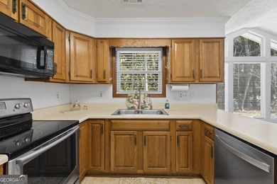 Ideally located in the heart of Peachtree City, this inviting on Canongate At Flat Creek Club in Georgia - for sale on GolfHomes.com, golf home, golf lot