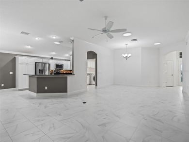 Welcome to refined Florida living in this exceptional Iris model on Pennbrooke Fairways in Florida - for sale on GolfHomes.com, golf home, golf lot