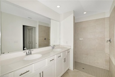 This southwest-facing GROUND FLOOR DiAngelo model, newly built on Panther Run Golf Club in Florida - for sale on GolfHomes.com, golf home, golf lot