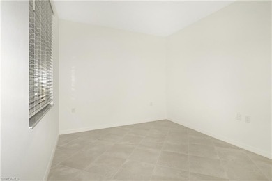 This southwest-facing GROUND FLOOR DiAngelo model, newly built on Panther Run Golf Club in Florida - for sale on GolfHomes.com, golf home, golf lot