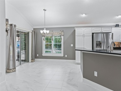 Welcome to refined Florida living in this exceptional Iris model on Pennbrooke Fairways in Florida - for sale on GolfHomes.com, golf home, golf lot